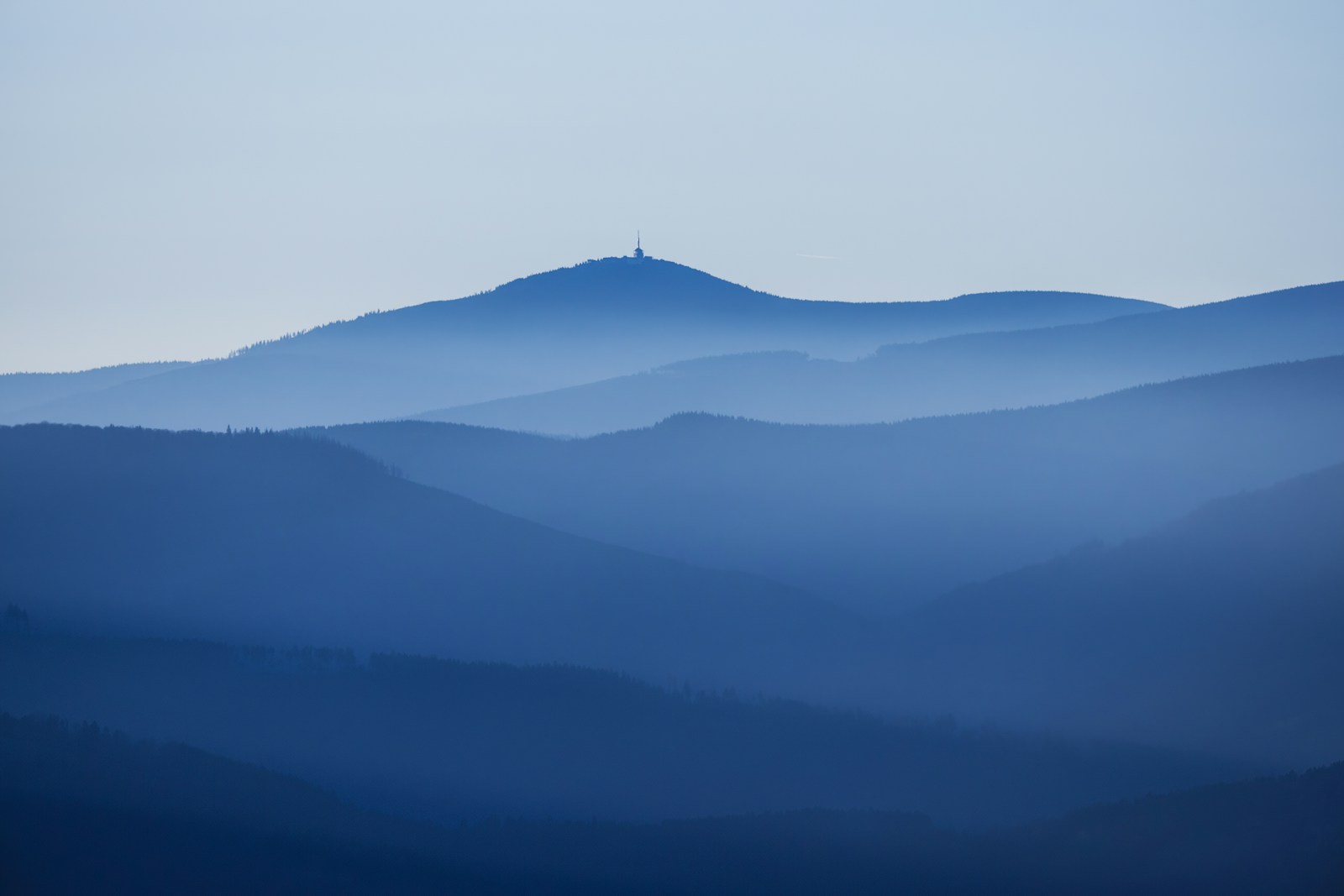 black mountain under white sky during daytime