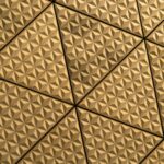 a close up of a ceiling with a pattern on it