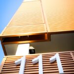 brown and white concrete building under blue sky during daytime