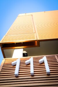 brown and white concrete building under blue sky during daytime