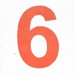 a close up of a number six on a white background